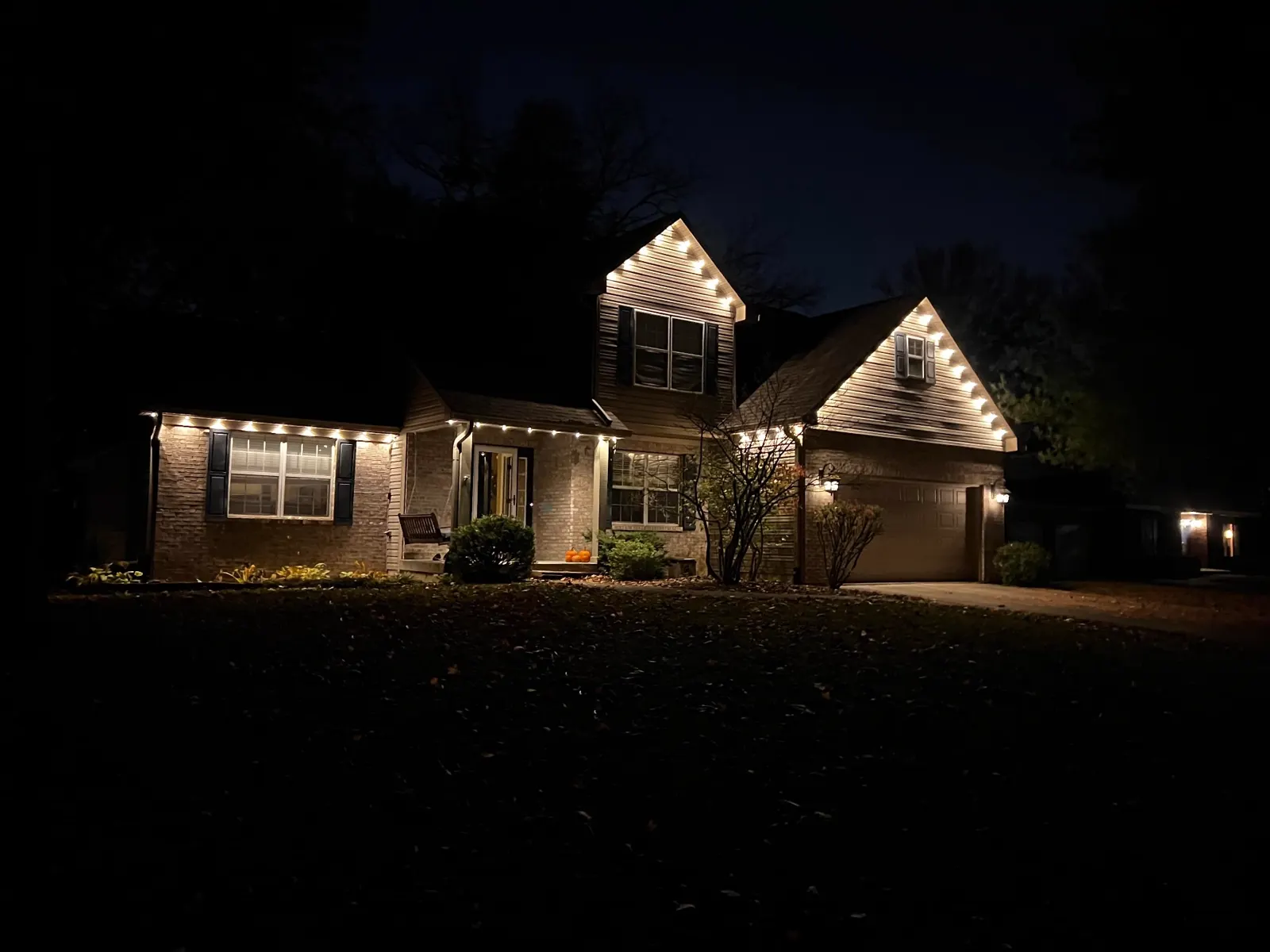 Home with warm white roofline LED lighting